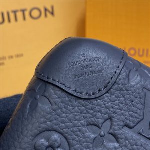 Louis Vuitton Horizon Clutch